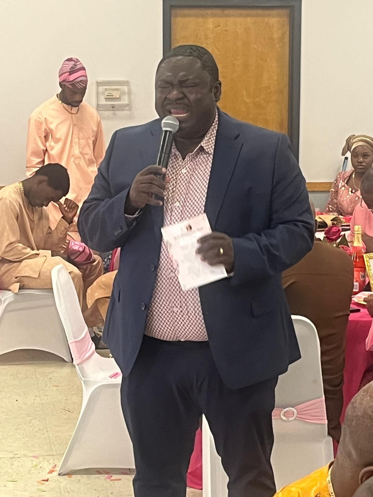 Pastor speaking at THM event