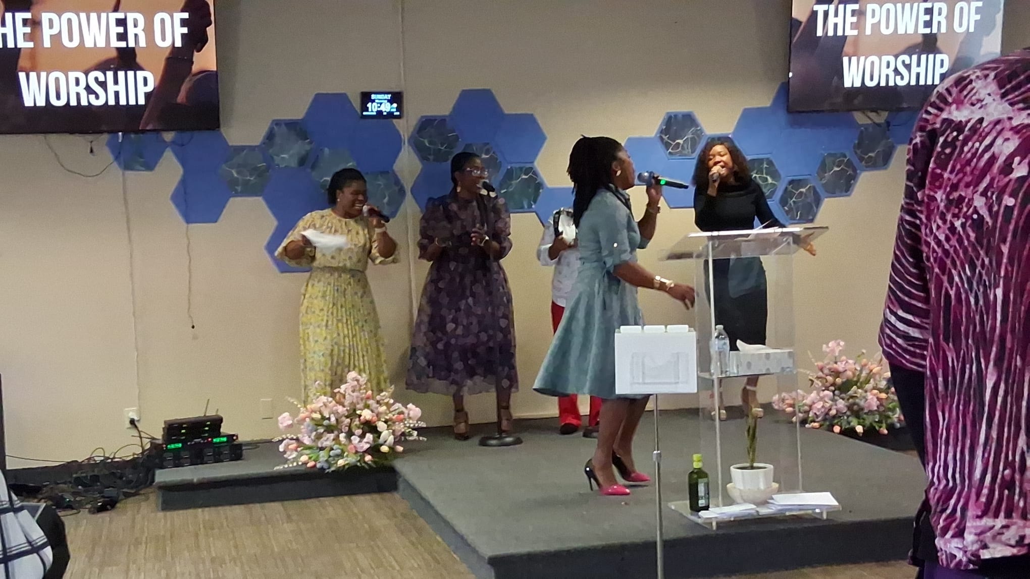 THM worship singers on stage